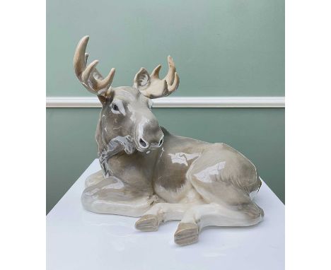 LARGE ROYAL COPENHAGEN MODEL OF AN ELK, in recumbent pose, model number '2813', printed marks to base, 28cms longProvenance: 