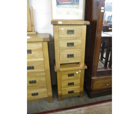 PAIR OF LIGHT OAK THREE DRAWER BEDSIDE CABINETS, 50CM WIDE
