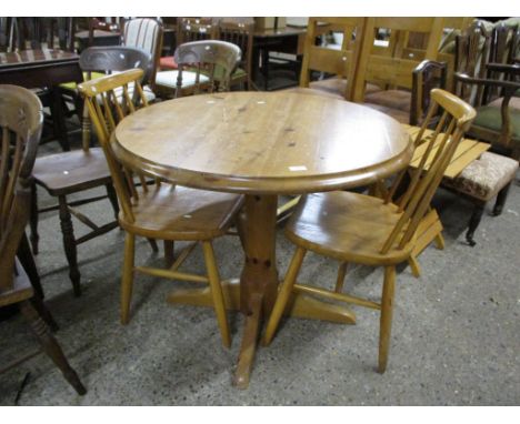 MODERN PINE CIRCULAR PEDESTAL BREAKFAST TABLE AND TWO STICK BACK CHAIRS