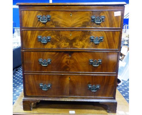 A George III chest of two deep drawers, displaying four drawer fronts, raised on bracket feet, 69 x 49 x 77 cm H. Not availab