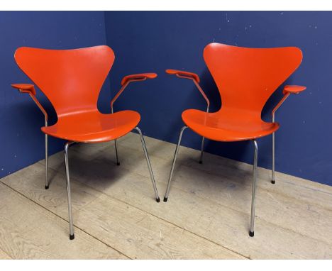 Original Arne Jacobsen armchairs in Orange, model 3207 by Fritz Hansen. Chrome Plated tubular steel frame with original paint