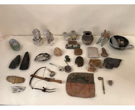 A box of antiquities and artefacts, to include ceramic vase labelled Roman found in London 1886, stone axe head,  see photos 