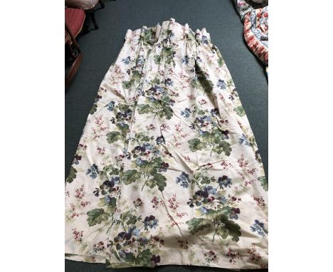 Pair curtains cream back ground with floral pattern. Lined. 200 drop 194 width 