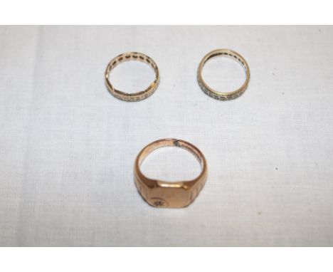 A 9ct gold signet ring with inset diamond, 9ct gold eternity-style ring and one other similar ring (3)