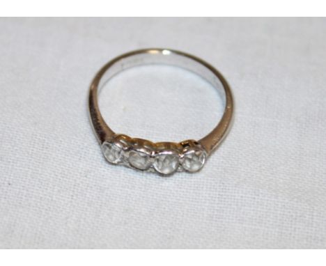 An 18ct white gold engagement ring set four diamonds (2.4g)