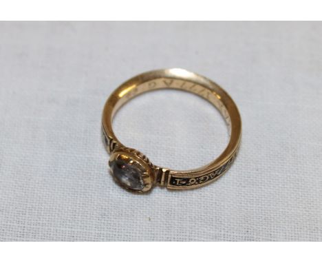 A George III mourning ring with black enamel decoration "William Donnithorne Di.26 Fe 1777 Ag.64", the interior engraved " I.