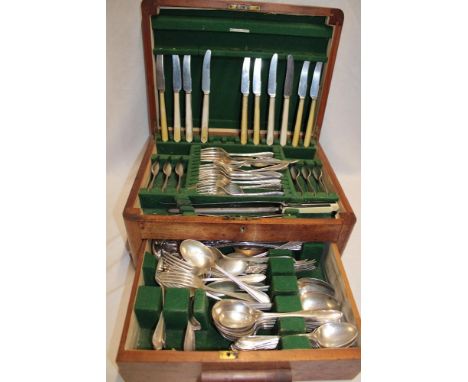 DAY THREE - FRIDAY 3rd MAY AT 10.00amA 1920's/30's walnut freestanding canteen containing a near complete set of silver-plate