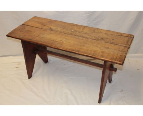 An old rustic pine rectangular bench/occasional table on standard supports, 35½" long