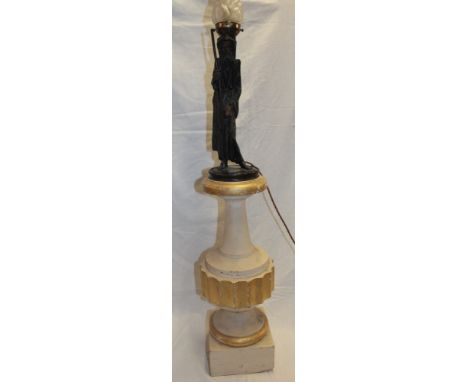 An unusual table lamp/floor lamp, the painted metal stem modelled as an elderly traveller on painted pedestal base with opaqu