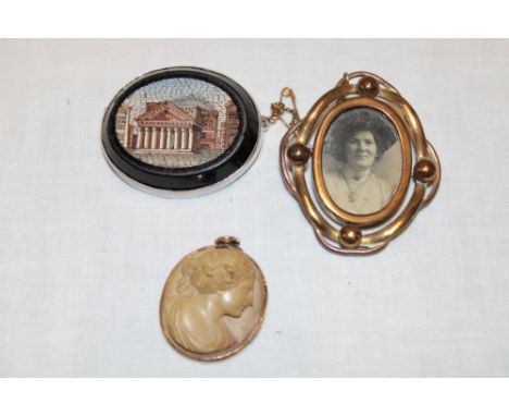 A Victorian oval cameo pendant with female portrait decoration, micro mosaic-style oval brooch and one other (2)
