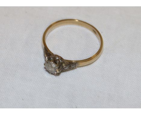 An 18ct gold engagement ring set a diamond solitaire (2.5g)