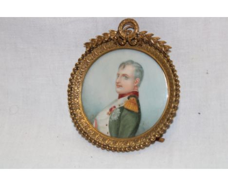 A miniature watercolour depicting a bust portrait of Napoleon signed Castel, the reverse marked "Napoleon Xavier de la Roche"