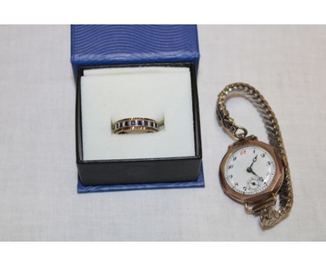 A ladies' 9ct gold wristwatch with expanding strap and a 9ct gold mounted eternity-style ring (2)