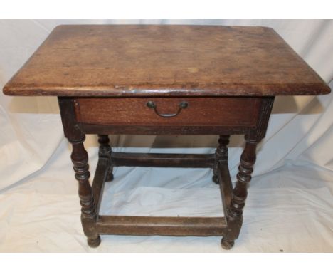 An 18th century oak rectangular side table with a single drawer in the frieze on bobbin turned legs, 30" x 19"