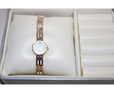 A ladies' 9ct gold wristwatch by Rotary with 9ct gold pierced link strap in original case with paperwork