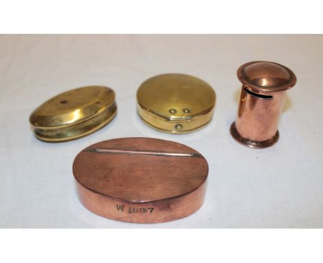 An old brass Welsh miner's-style oval snuff box, a 19th century copper oval snuff box marked "W 1887", a small copper money b