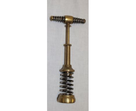 A good quality brass and steel double tap action corkscrew with spiral body