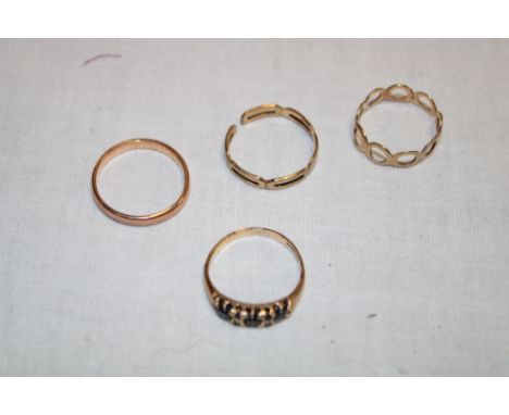 A 9ct gold dress ring set sapphires, 9ct gold wedding band and two various pierced 9ct gold rings (4) (5.5g)