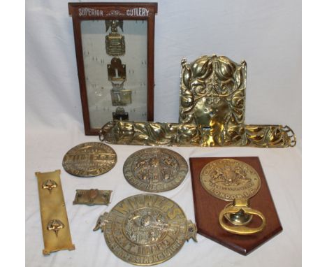 Four various brass safe plaques including Milner's, Griffiths etc., an Art Nouveau elaborate brass door finger plate, superio