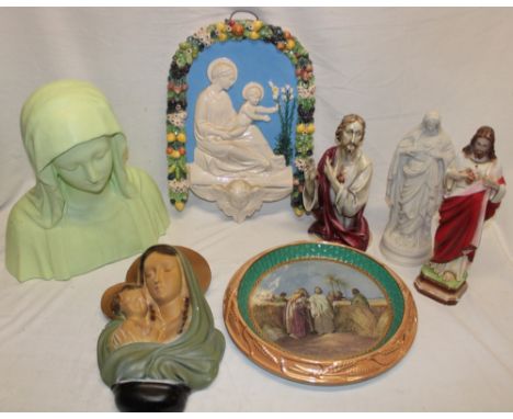 A selection of religious plaques and figures including a large plaster bust figure of the Virgin Mary, 14" high; a china reli