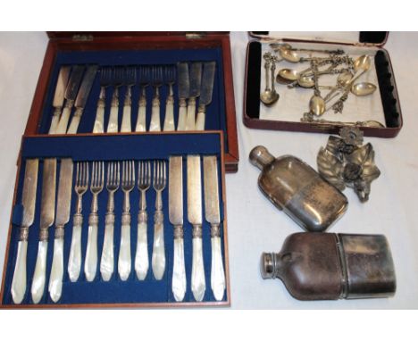 A set of twelve electroplated tea knives and forks with mother-of-pearl handles in lined mahogany case, two various silver-pl