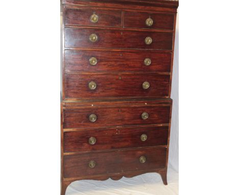 A George III mahogany chest on chest, the base with three long graduated drawers and brushing slide, the upper portion with t