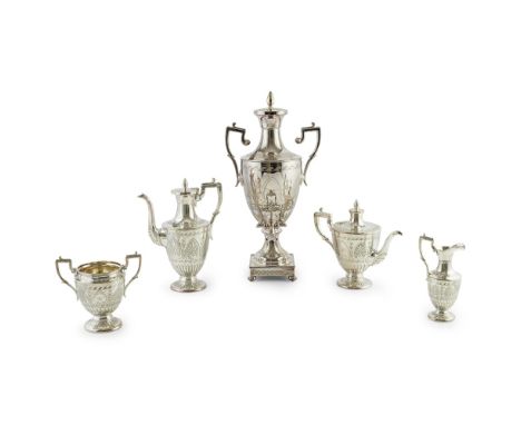 A five piece tea service  comprising, tea urn, teapot, waterpot, milk jug, and sugar bowl, of all of vase shape, classical sc