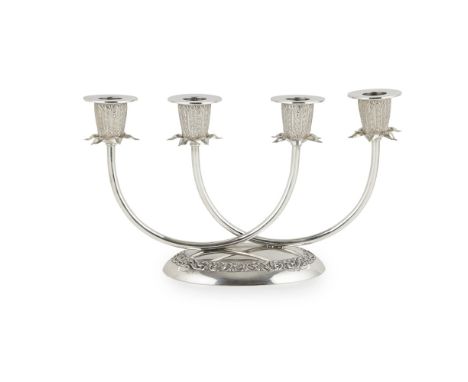 A four light table candelabra  marked THAINAKON/ STERLING/ THAILAND, modelled as two curved branches each with two tapered no