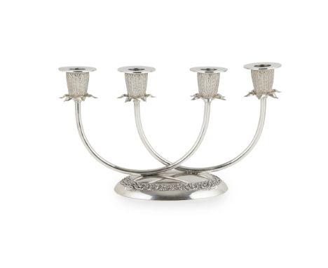 A four light table candelabra  marked THAINAKON/ STERLING/ THAILAND, modelled as two curved branches each with two tapered no