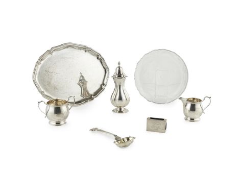 A 19th century Russian parcel gilt sugar sifter  Moscow 1847, trefoil terminal to an oval silver gilt bowl with pierced desig