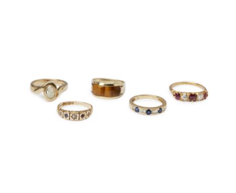 A collection of gem set rings  to include an 18ct gold ruby and diamond set ring, an 18ct gold sapphire and diamond set ring;