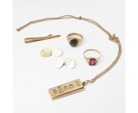 A collection of gold jewellery  to include a 9ct gold feature hallmark pendant, a pair of 9ct gold cufflinks; a 9ct gold tie 