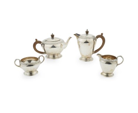 A 1950s four piece tea service  Wakely & Wheeler, London 1955, comprising teapot, water pot, twin handled sugar bowl and milk