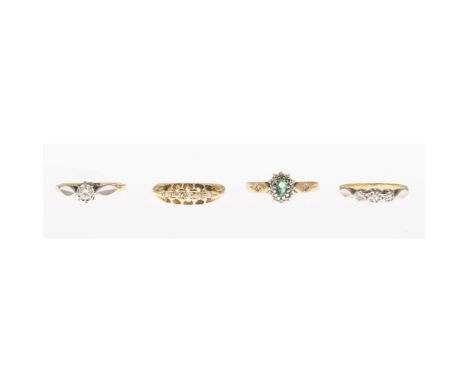 A collection of four gem set rings  to include an 18ct gold five stone diamond set ring; an illusion set three stone diamond 