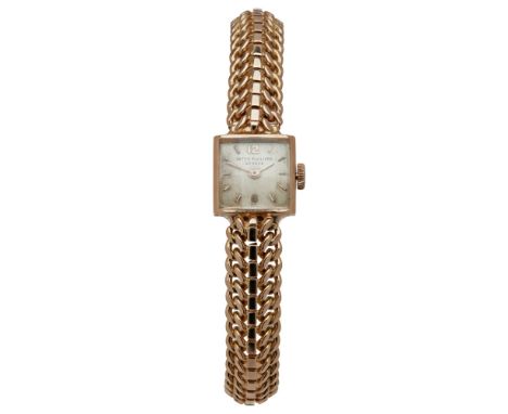 PATEK PHILIPPE - A lady's 18ct gold cased wrist watch  the brushed square dial with baton indicators, plain bezel curved glas