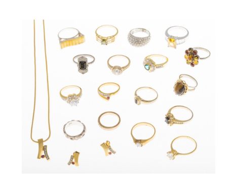 A collection of gem set jewellery  to include a ruby and paste set pendant, ring and earring set; a sapphire and paste set cl