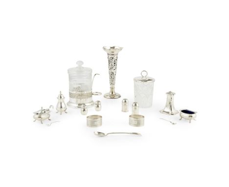 A collection of silver  to include, a spill vase, W.A., Birmingham 1910, of pierced open form, a silver lidded glass jam jar,