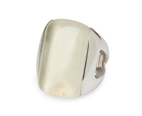 A gem set ring, Gavello  channel set with a large oblong white gem, to a white metal shank stamped 750, Gavello  Ring size: J