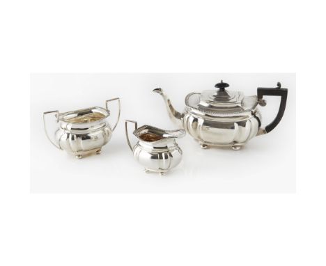 A three piece tea service  S Blanckensee & Sons Ltd, Birmingham 1922, comprising a teapot, twin handled sugar bowl and milk j