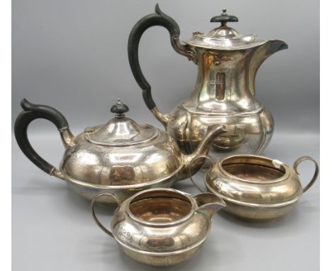 George V silver three piece Batchelor's tea service, compressed circular bodies with single band, by Barker Brothers Silver L