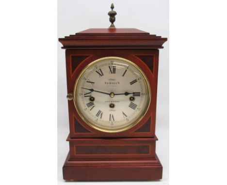Sewills Liverpool - mahogany cased bracket clock, stepped case with brass urn finial, cream Roman dial with Arabic five minut