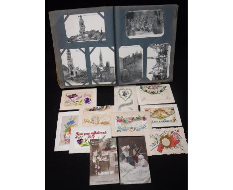 FIRST WORLD WAR INTEREST: A PERIOD POSTCARD ALBUM containing silk postcards (8) 'Papa sera un Hero' photographic postcards (6