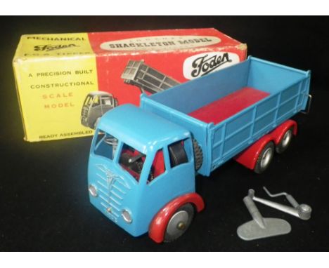 SHACKLETON TOYS: A MECHANICAL 'FODEN' F.G.6. TIPPER, in blue with red wings and lorry bed. with keys (boxed) Condition:  the 