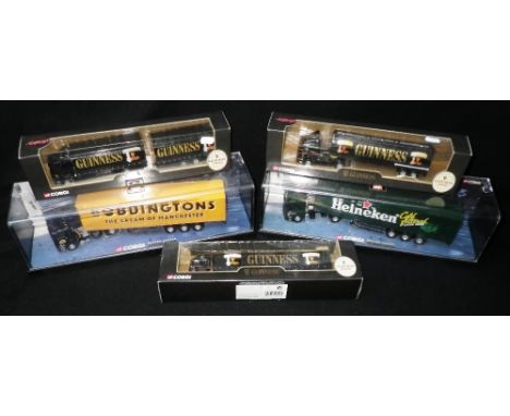 CORGI: MODERN TRUCKS, A 'Heineken' lorry and a 'Boddingtons' lorry, both in perspex boxes and three 'Guinness lorries (boxed)