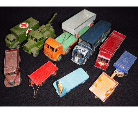 DINKY TOYS: A 'SUPERTOYS' MILITARY RECOVERY TRUCK, an ambulance, a 'Foden' flat bed lorry and a collection of similar commerc