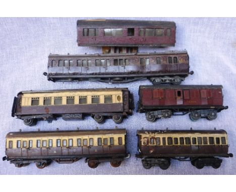 AN EARLY 20TH CENTURY 'O' GAUGE 'G.W.R.' FIRST CLASS CARRIAGE with others similar Condition:  ALL HAVE BEEN BADLY STORED¦the 