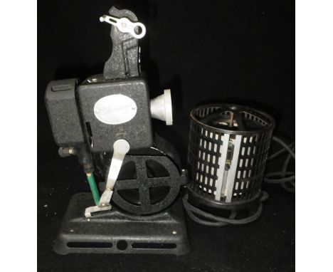 A VINTAGE 'PATHESCOPE KID' HAND CRANKED PROJECTOR  Condition:  appears in good condition and winds¦not tested¦in an associate