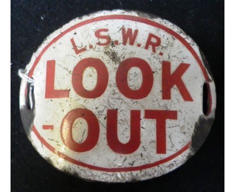 RAILWAY INTEREST: A VINTAGE 'L.S.W.R.' ENAMEL ARM BADGE, in white with red 'LOOK-OUT'  lettering 3" high Condition:  This has