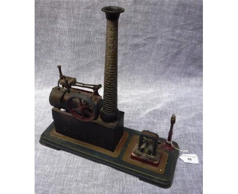 BING: AN EARLY 20TH CENTURY MODEL STEAM ENGINE, with dynamo and tripod lamp. Constructed in tin-plate with brass boiler. 35cm