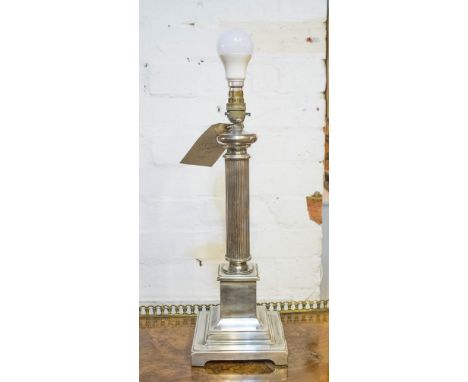 LAMP BASES, a pair silvered metal with reeded column and stepped plinth base. (2)